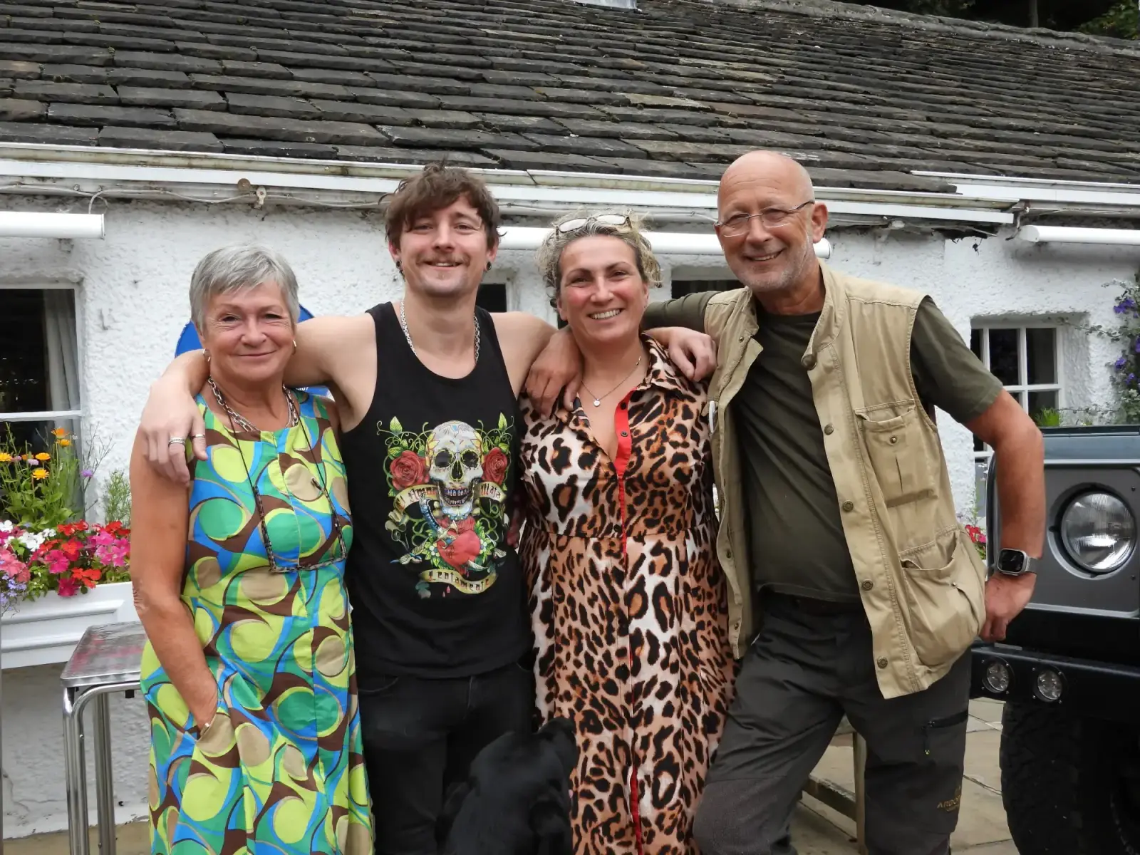 Four members of the Old Bridge Inn family outside the inn