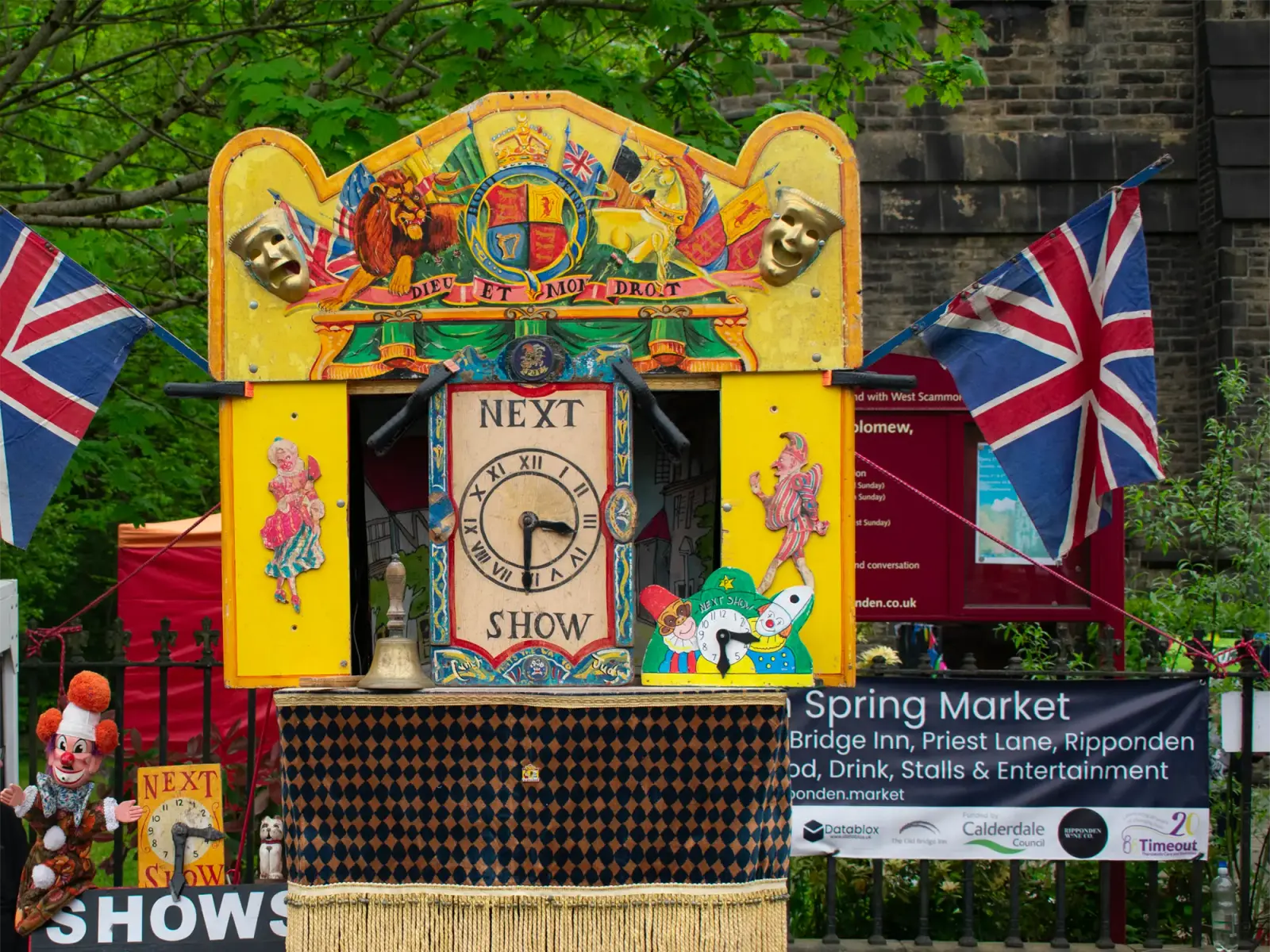 A traditional puppet theatre at the Ripponden Spring Market outside The Old Bridge Inn