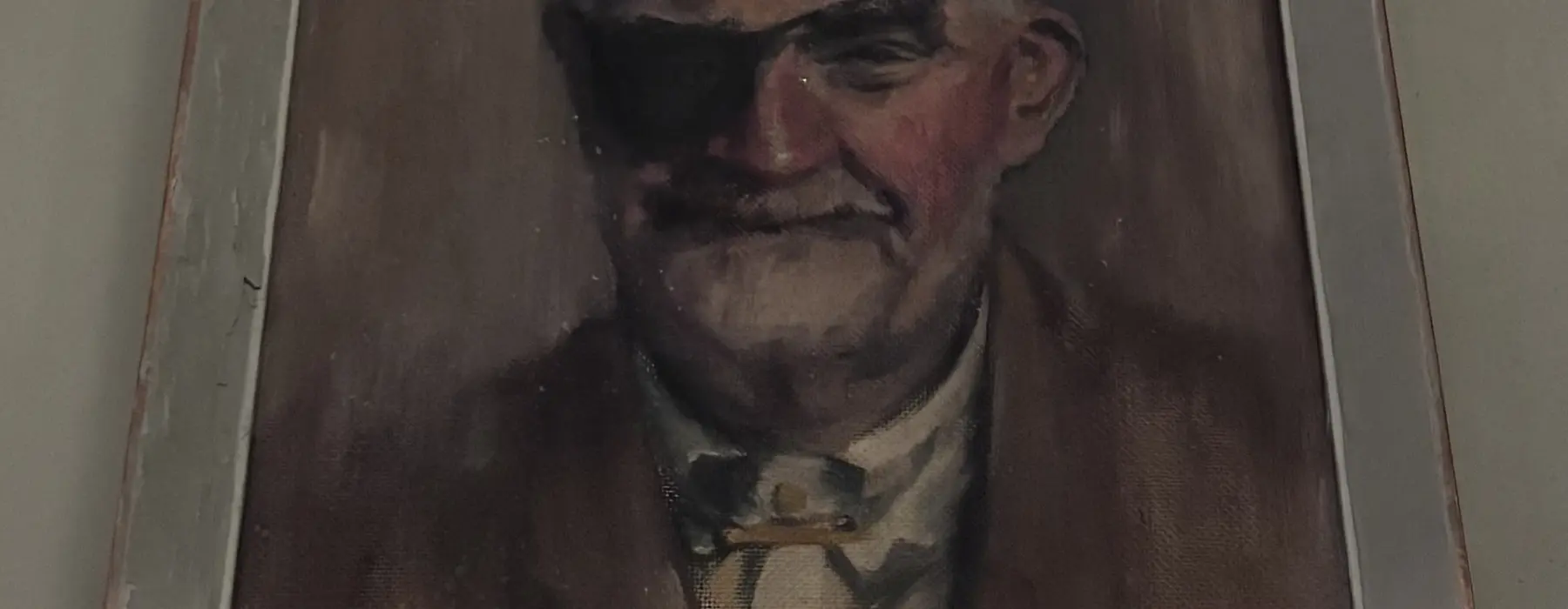 a painting of ted banks by George Barrett and with his eye patch on
