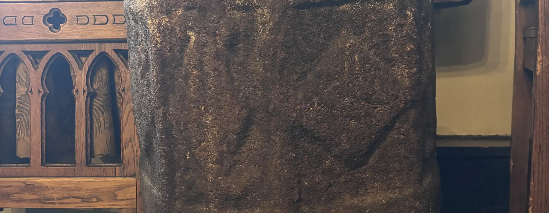 stone baptist font with engraving